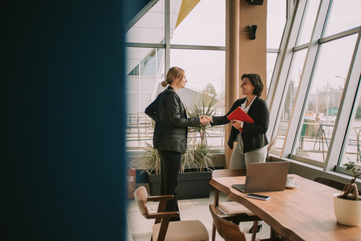 Handshake between two business colleagues.