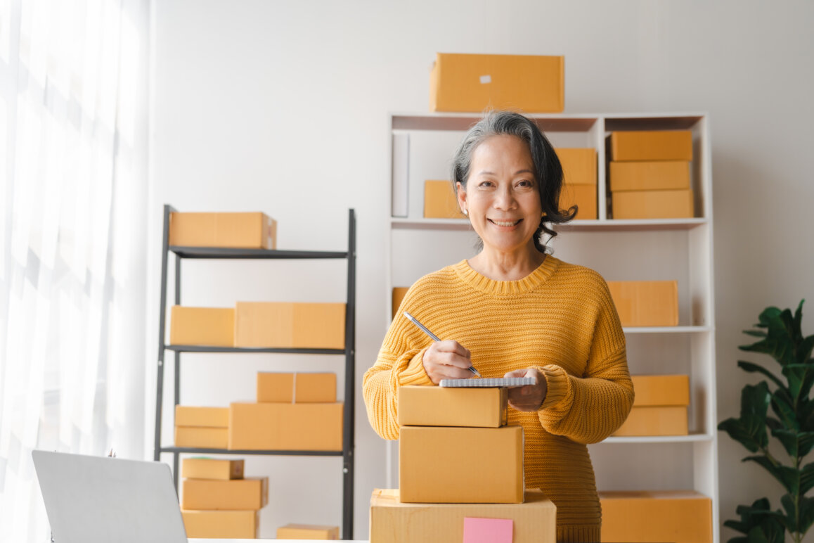 Small business owner mailing packages.